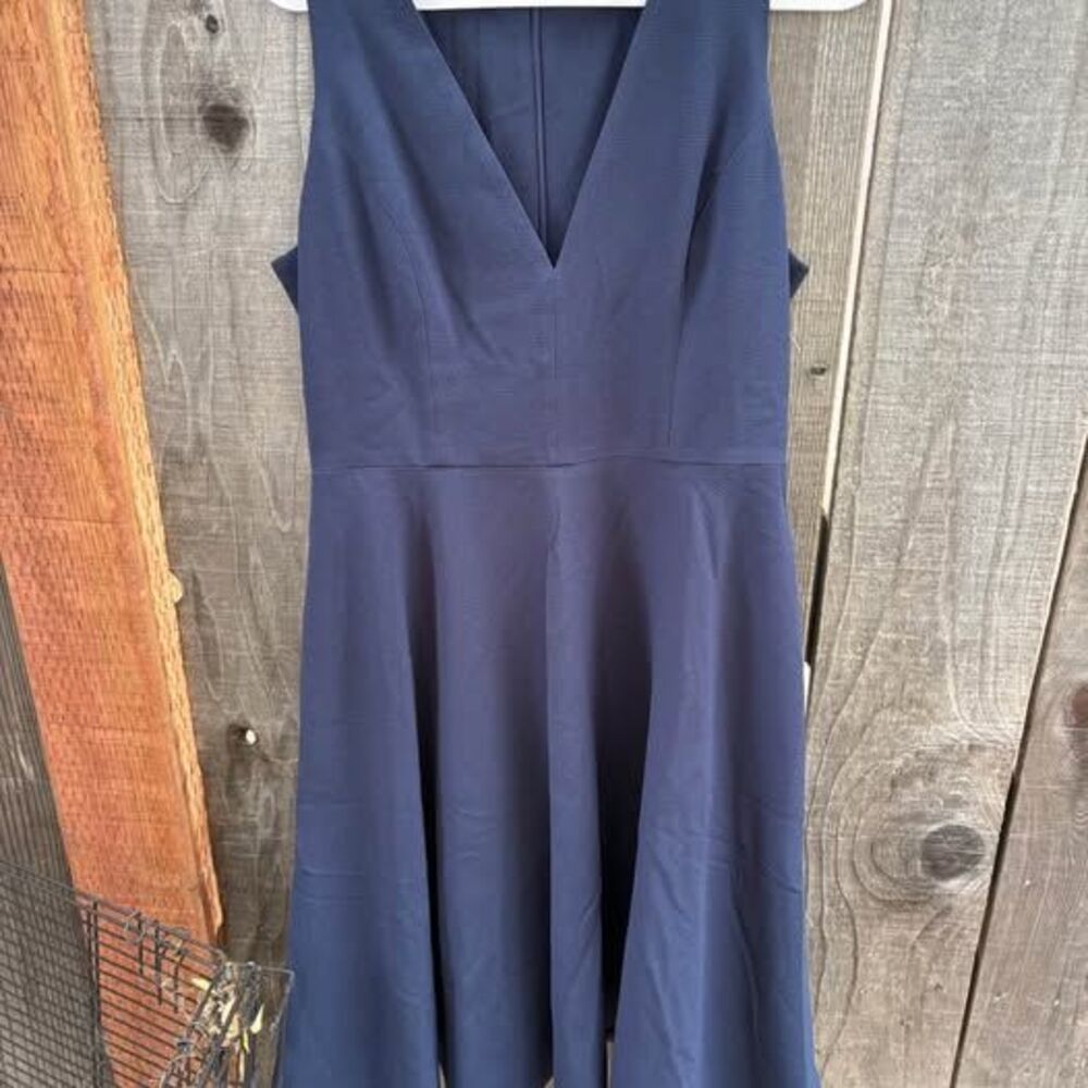 Dress The Population Catalina fit and flare dress features a deep V-neckline xxl